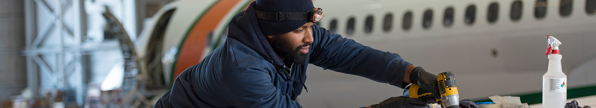 AerSale employee working on a plane