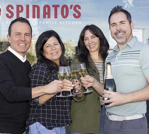 The Spinato's family cheers with champagne toast