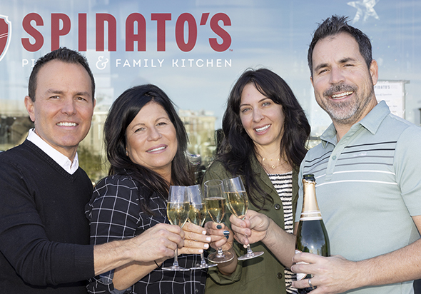 The Spinato's family cheers with champagne toast